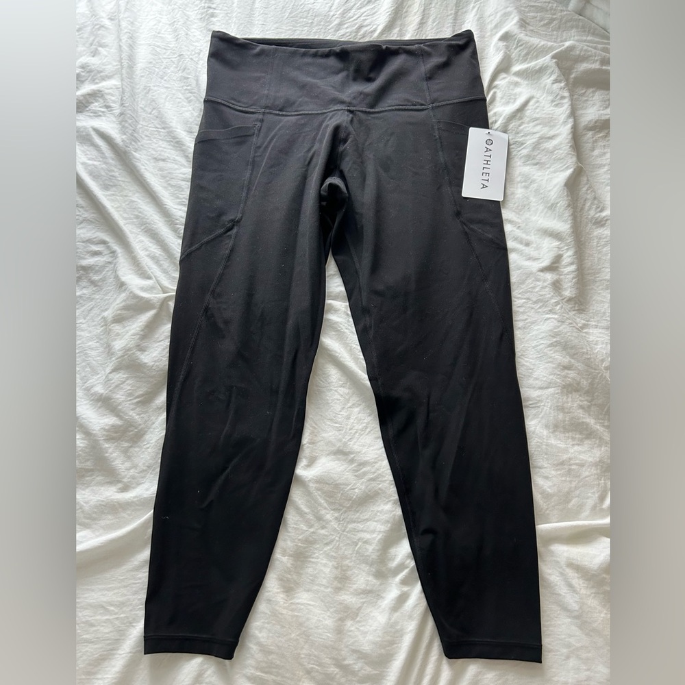 Athleta Stash Pocket Salutation Tight